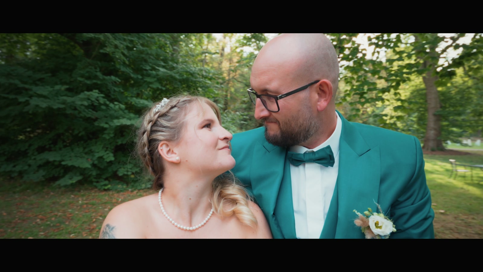 The longer edit follows the day from the early preparations through the ceremony and celebration.